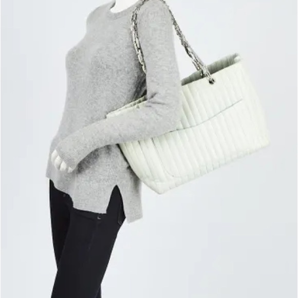 AuthenticCHANEL
Light Green Quilted Lambskin Leather Mademoiselle Giant Tote Bag - Picture 2 of 14